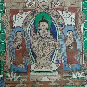 Antique Mongolian thangka in an old frame.