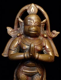 Antique Hanuman sits 5.75 inches tall.