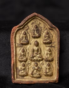 Fine Tibetan clay image of a multiple Buddha images.