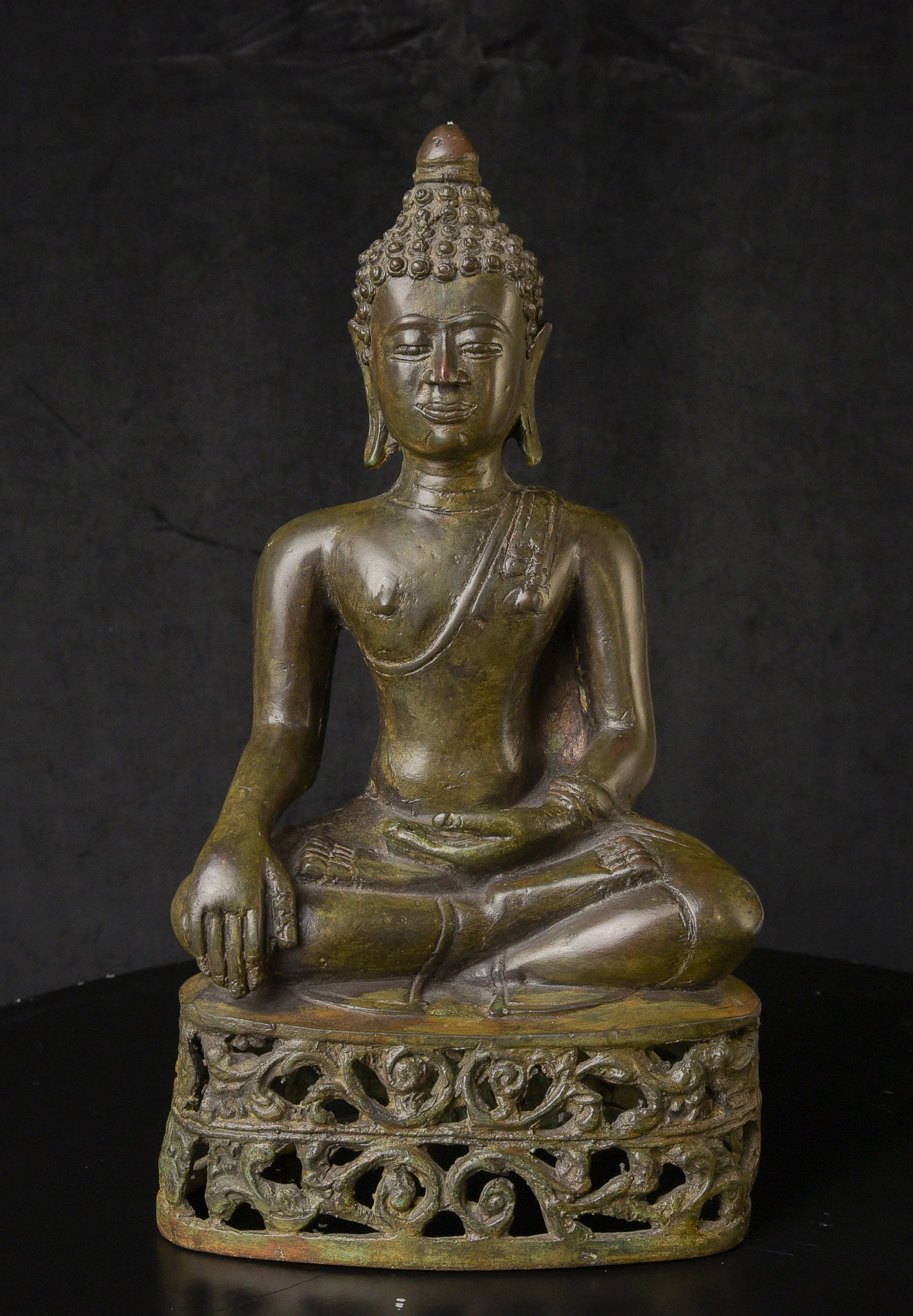 Circa 1900 Buddha with a pleasing face and an outstanding base.: Circa 1900 Buddha with a pleasing face and an outstanding base. It is hard to find an authentic older Buddha of this size, and this is nice at this price. - ( 13"H x 7"W x 4.5"D ) - 8.30lbs