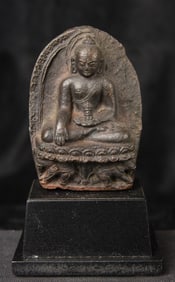 Early Himalayan Buddha atop a pair of powerful elephants.