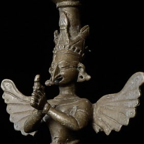 Bronze Garuda is 7.75" tall, diameter on bottom is 4".