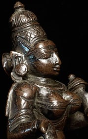 Very fine antique Hindu bronze on an unusual solid cast