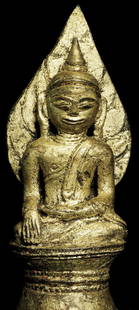14-16thC Burmese Ava style antique Buddha- RARE: Burmese Ava style antique Buddha. In a 14-16thC style.Looks to be re-gilded, and is permanently affixed to his base. Total height is 6.75 inches. Attached base is 1.25 inches tall, 2.5 x 2 inches.