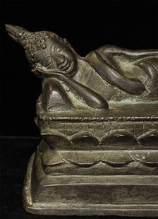 19th/early 20thC Thai Bronze Reclining Buddha.: 19th/early 20th Thai Bronze Reclining Buddha. It Lays 5.5" long, and stands 3.25" at the highest point. Domestic Insurance is included. International shipping will be $50 including packing, shipping,