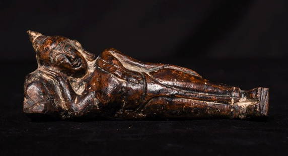 16/7th century Thai Reclining Stone Buddha-Finely carved- Expressive, animated: Rare 16/7th century Thai Reclining Stone Buddha With remains of black lacquer. I've come across extremely few of this type in 35 years of collecting and selling. each one is a "one of". It is in the A