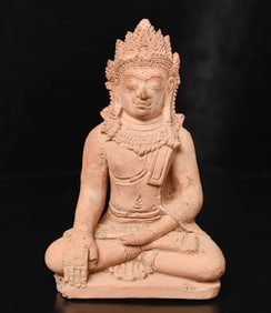This is a 10/11thC "Haripunchai" style terracotta Buddha.