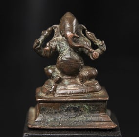 Classic 18-19thC near miniature Indian bronze four-arm Ganesh.