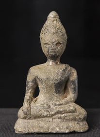 Mysteries early SE Asian Buddha, cast of a lead alloy, plus possibly silver.