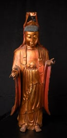 Large 18/19thC Chinese Quanyin carved out of wood and lacquered.