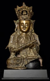 Large Ming Bronze Bodhisattva of Compassion with beautifully rolled scroll.