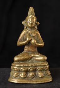 12thC or later Tibet or other nearby early Himalayan Kingdom. Silver inlaid eyes.