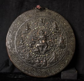 18th/19th century Tibetan or Nepalese round copper repousse Buddhist Reliquary.