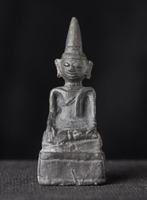 Miniature Laos bronze Buddha . Appears to have some age to it.