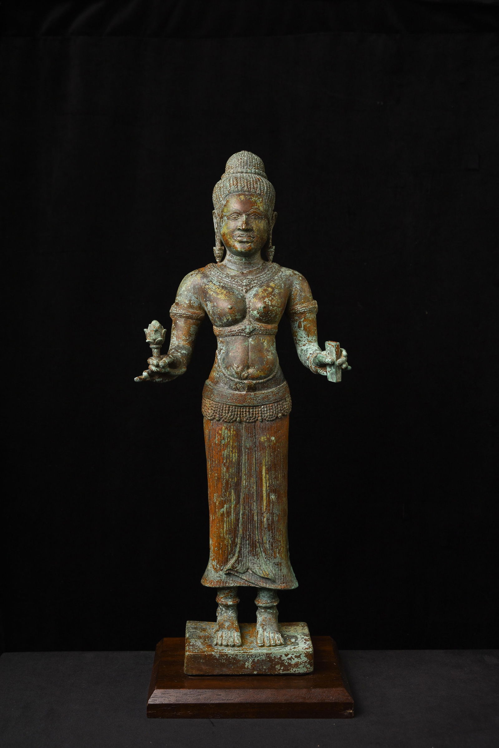13thC/Later Cambodian Sculpture of The Hindu Goddess Uma from the Bayon Period: 13th Century Cambodian Bronze Uma, Bayon Period — Monumental and Exceptionally Refined. This extraordinary 13th-century Cambodian bronze sculpture of the Hindu goddess Uma, dating to the Bayon perio
