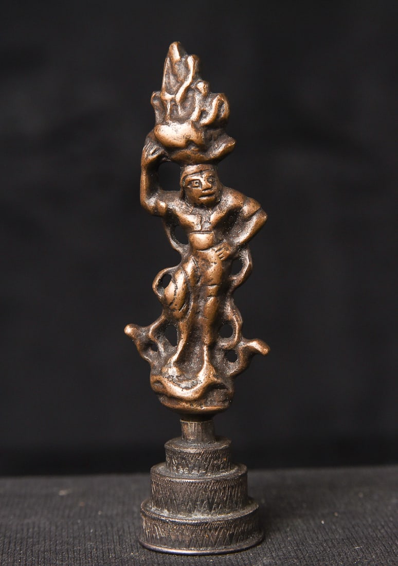 Tang dynasty devotee carrying an offering basket on his head.: Tang dynasty devotee carrying an offering basket on his head. Quite wonderful! The devotee measures 2.25" tall and 3.25" tall on its custom base. Never seen another like it- even in books. Reportedly