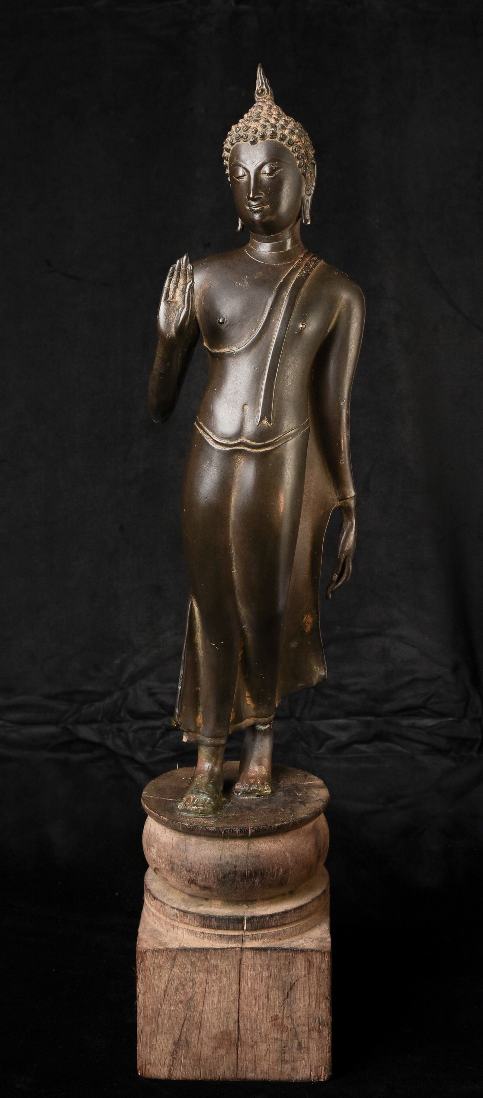 19th century walking Suko Thai bronze Buddha. Large fine example.: 19th century walking Suko Thai bronze Buddha. Large fine example. Beautifully sculpted cast and finished. Possible early repair at the ankles (common on the larger heavily cast examples due to the amo