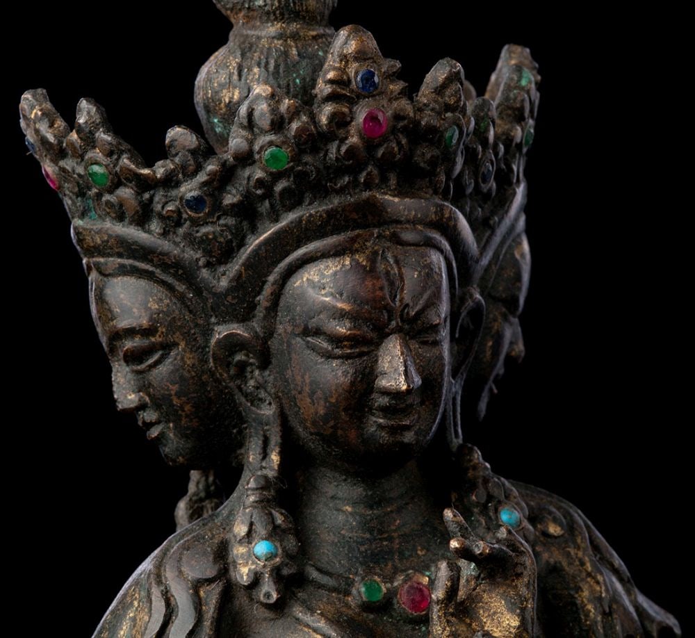 Antique Nepal/Tibet Three Face Eight Arm Bodhisattva, 7" Tall-Special: Lovely Vintage/Antique Nepalese/Tibetan Bodhisattva. Repair to the top of the head. It appears to have been entirely gilded originally. Approx 7 inches. It is very well cast. It appears to date from