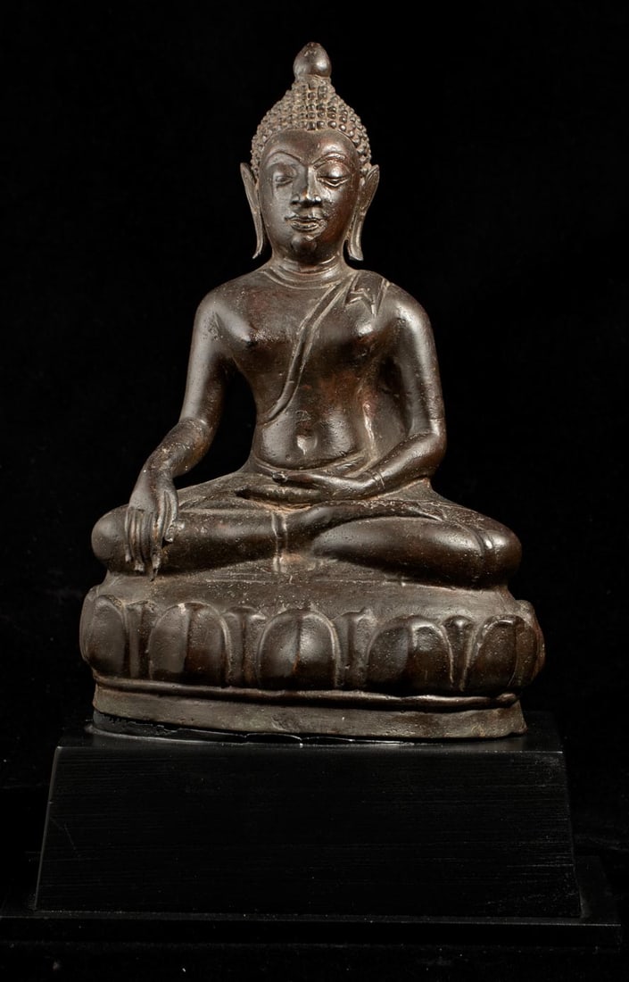Finely cast17/18thC Northern Thai Buddha.: Finely cast17/18thC Northern Thai Buddha. Measures 10 1/2 inches tall on its base, The base measures 2 1/2 inches tall x 7 inches across x 5 1/2 inches deep. The piece measures 8 1/2 inches tall x 5
