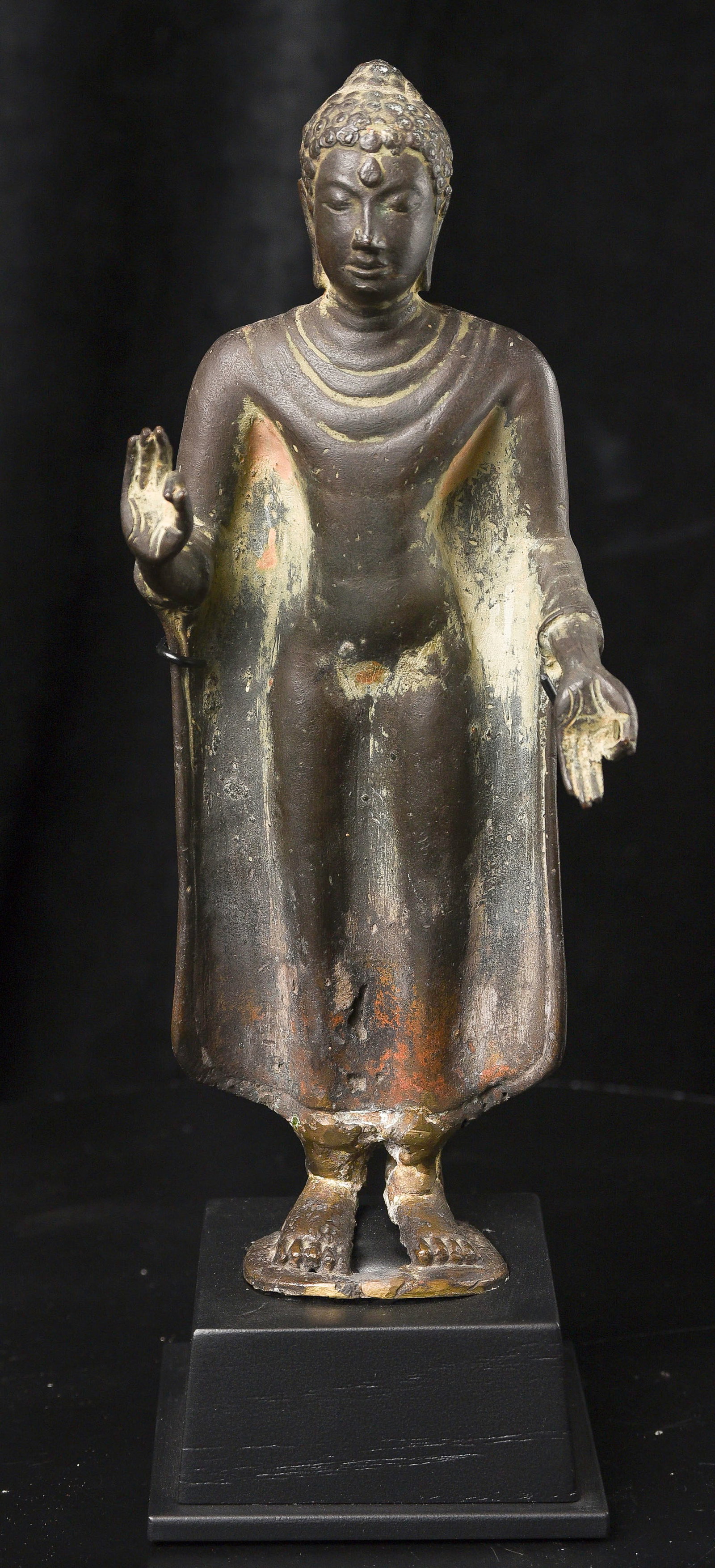 A Thai bronze standing figure of Buddha in 8th/9th century style. (1 of 17)