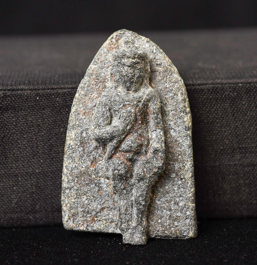 14/15th or earlier Thai or Cambodian Buddhist Amulet-In the 3/4 round! Sculptural: 14/15C or earlier lead alloy Thai or Cambodian Buddhist amulet in the 3/4 around. Highly unusual form . Significant wear that obscures much of the surface detail,. thevpatina is beautiful and compleme