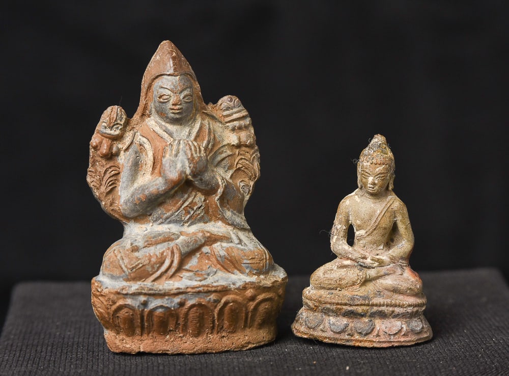 Mongolian or Tibetan clay figures- one small Buddha and a larger Tsong Ka Pa.: Mongolian or Tibetan clay figures- one small Buddha and a larger Tsong Ka Pa. ( 2"H x 1.25"W x .875"D ) - 30g - ( 1.5"H x 1"W x .5"D ) - 5g.ly 19thC. Deep Discount
