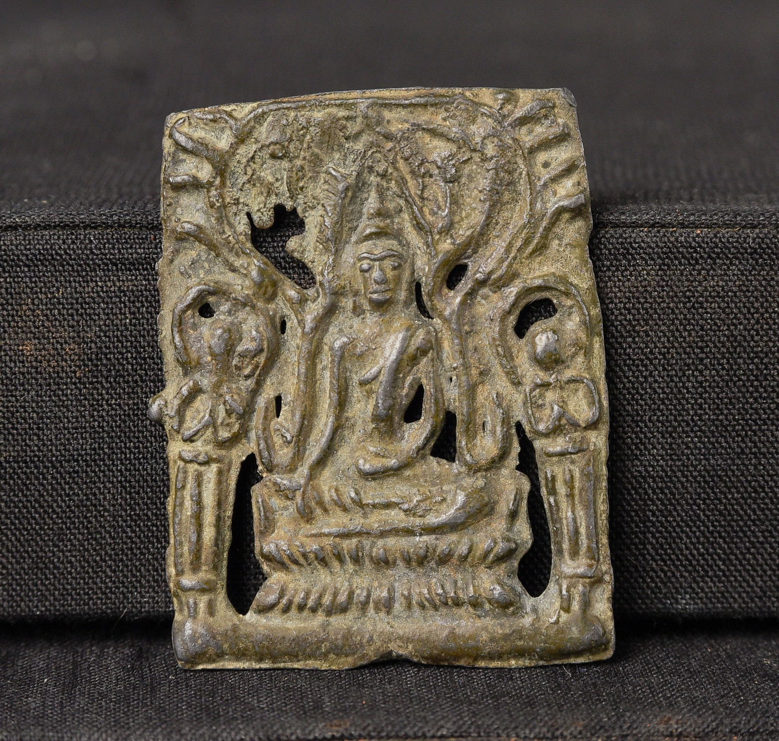 Burmese bronze plaque or amulet from an old collection of SE Asian amulets and small Buddhist: Burmese bronze plaque or amulet from an old collection of SE Asian amulets and small Buddhist objects collected in the 1970s and 80s. 16/17thC Mon style. Stands 1.75 inches tall. - ( 1.75"H x 1.375"W