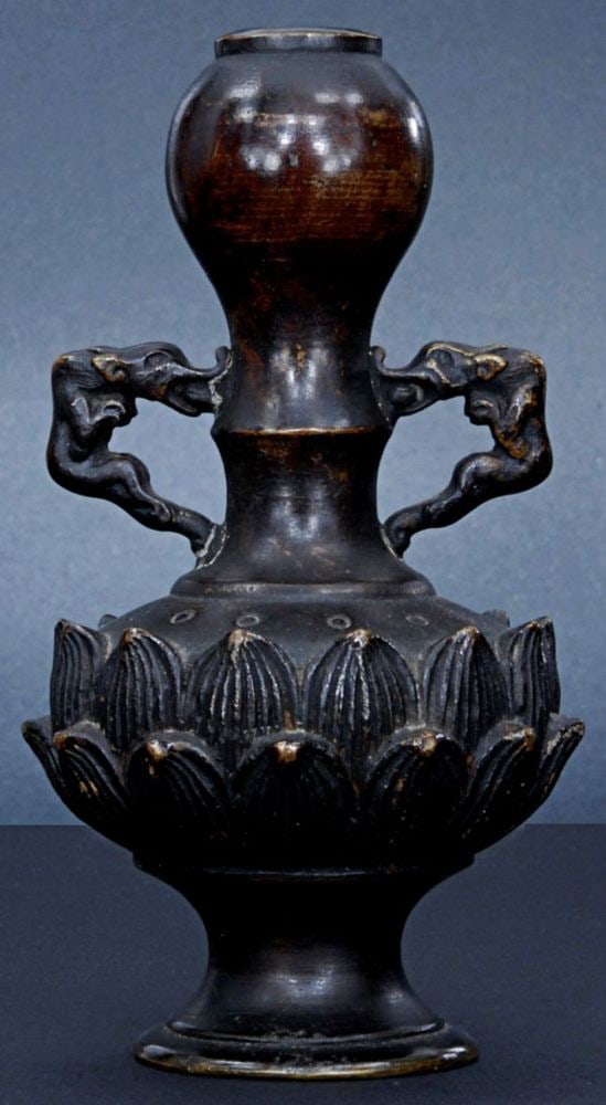 19th Century Japan bronze altar vase. Measures 4.25: 19th Century Japan bronze altar vase. Measures 4.25 inches tall. Domestic shipping is included. International shipping