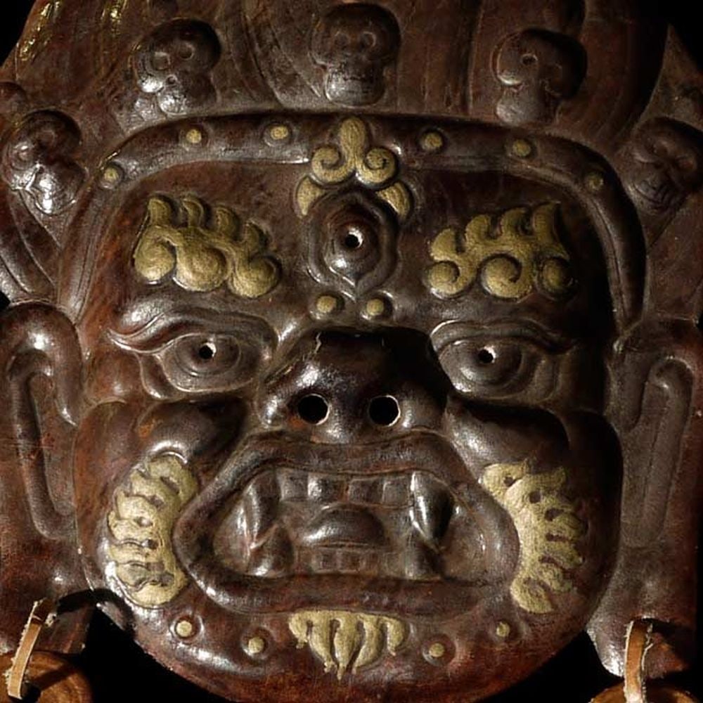 Vintage/old Tibetan or Mongolian leather protective-POWERFUL: Vintage/old Tibetan or Mongolian leather protective deity mask/face. 7" tall, not including earrings. 5.5" at widest point.