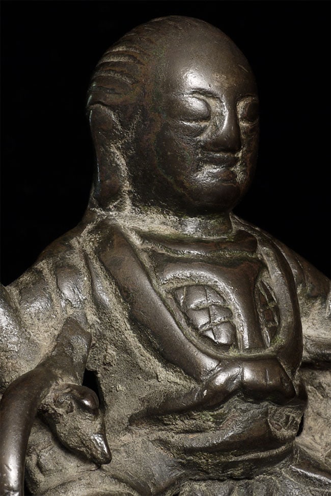 Chinese Ming Bronze. Loss to back as seen in the photos.: Chinese Ming Bronze. Loss to back as seen in the photos. Wonderful face. 4.25" tall. Lucite stand is 7/8" tall, 3.5" x 2.5 Deep discount.