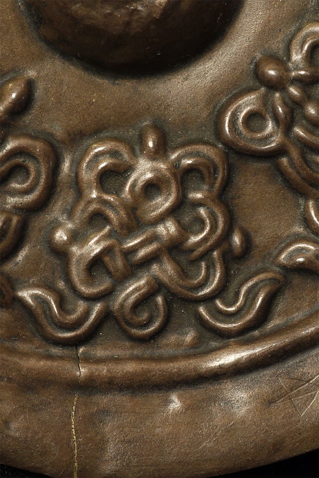 Stylized Antique Mongolian Copper Mandala.: Stylized Antique Mongolian Copper Mandala. Used to meditate on the freedom of suffering for all sentient beings. Diameter is 4 inches.