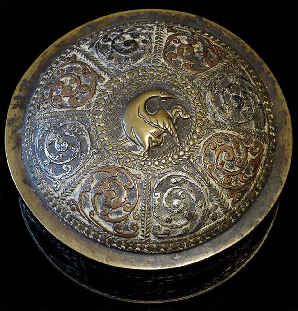 Antique Nepalese brass round box with copper.: Antique Nepalese brass round box with copper and silver overlay measures 4 inches in diameter by 2 1/2 inches high.