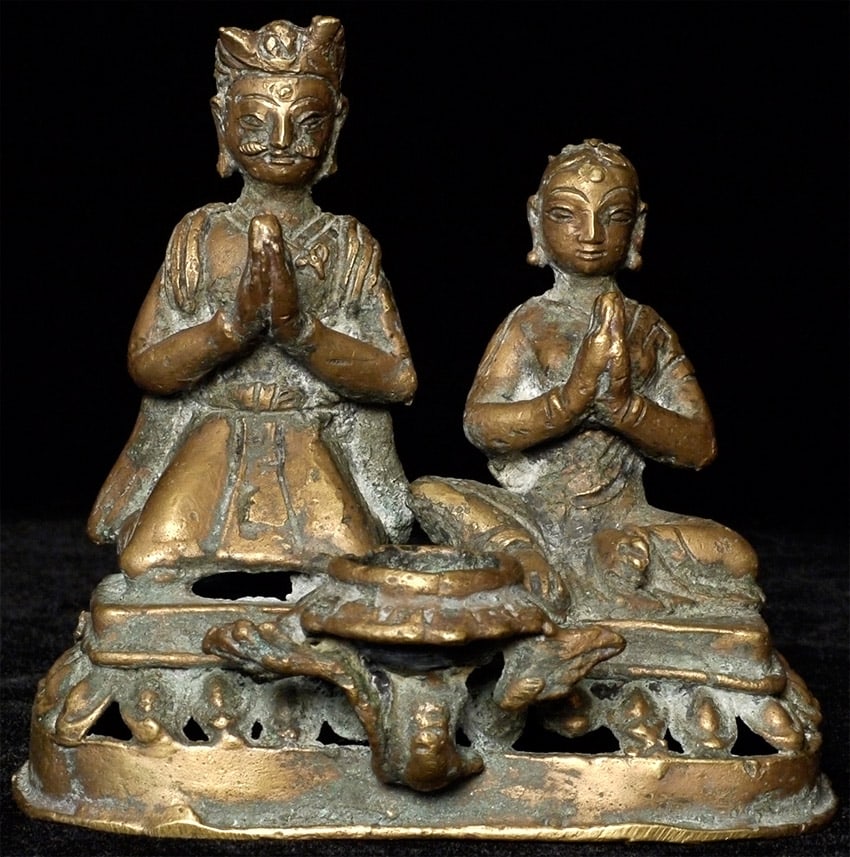 Antique Hindu Donor Couple Oil Lamp: Antique Hindu Donor Couple as Bronze Oil Lamp. Measures 3.75 inches tall, bottom measures 2 x 4-1/8 inches. Made by the Newari people.