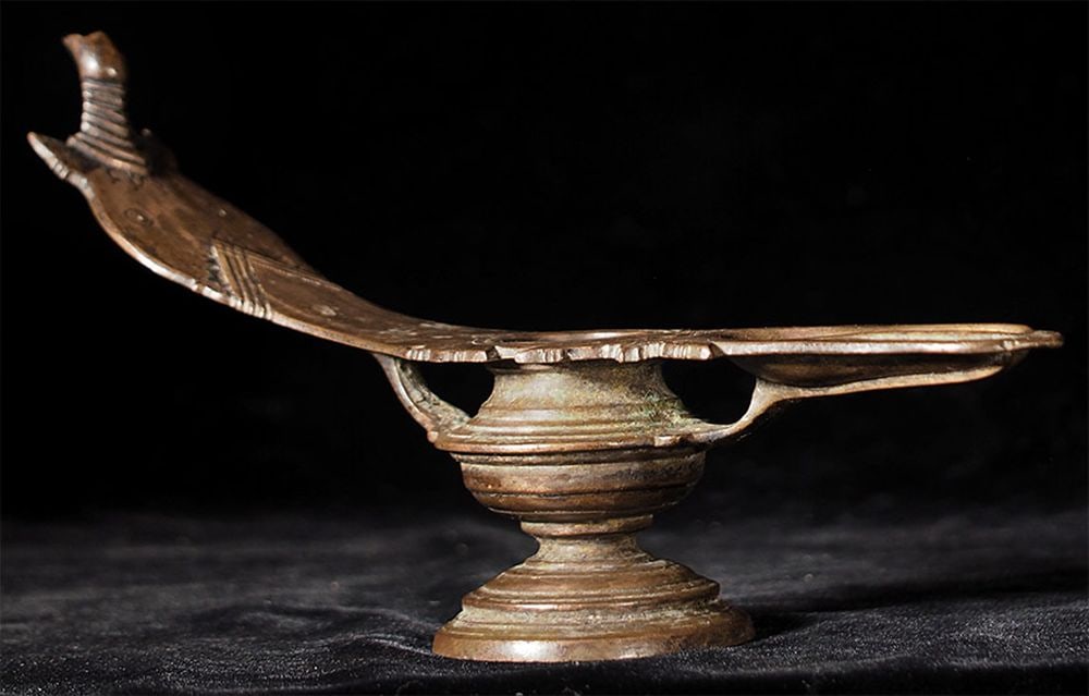 Antique Asian oil lamp. Looks to be missing a part at one end. Measures 10 7/8" long: Antique Asian oil lamp. Looks to be missing a part at one end. Measures 10 7/8" long