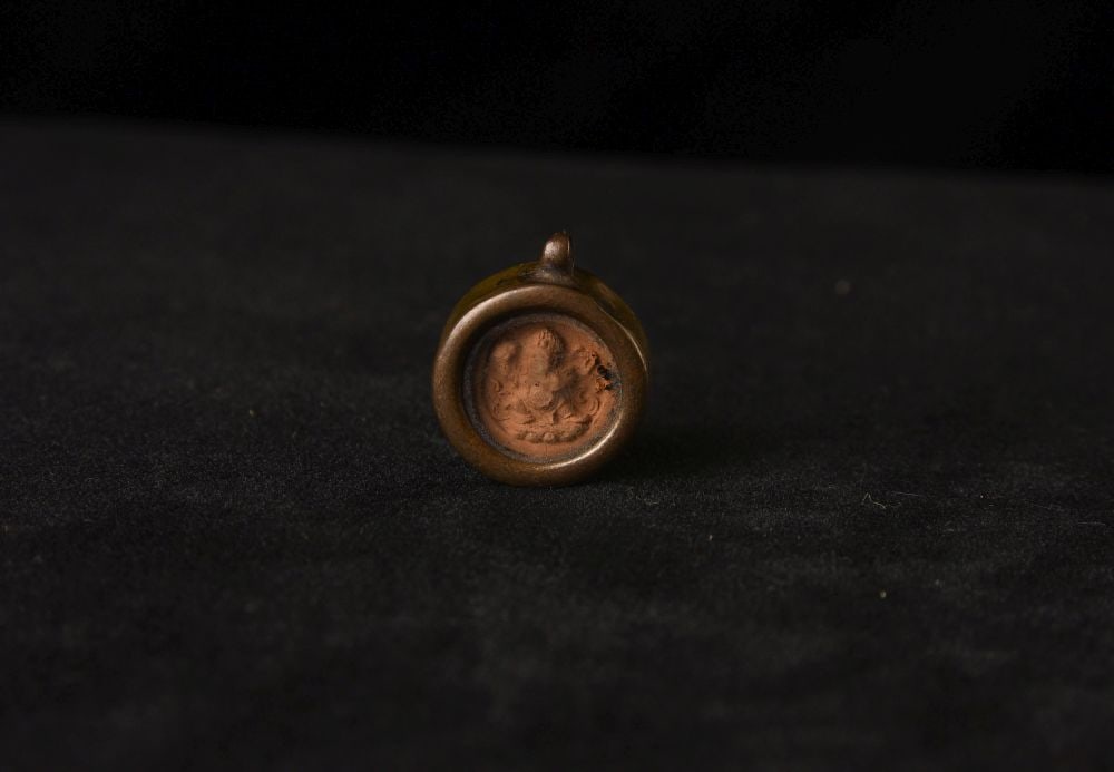 Two very small antique Tibetan Gau Boxes- one with clay tablet (worn) and one with tiny worn thangka: Two very small antique Tibetan Gau Boxes- one with clay tablet (worn) and one with tiny worn thangka - .05lbs - .020kg _ 1"H x 1"W : ( .75" Circle )