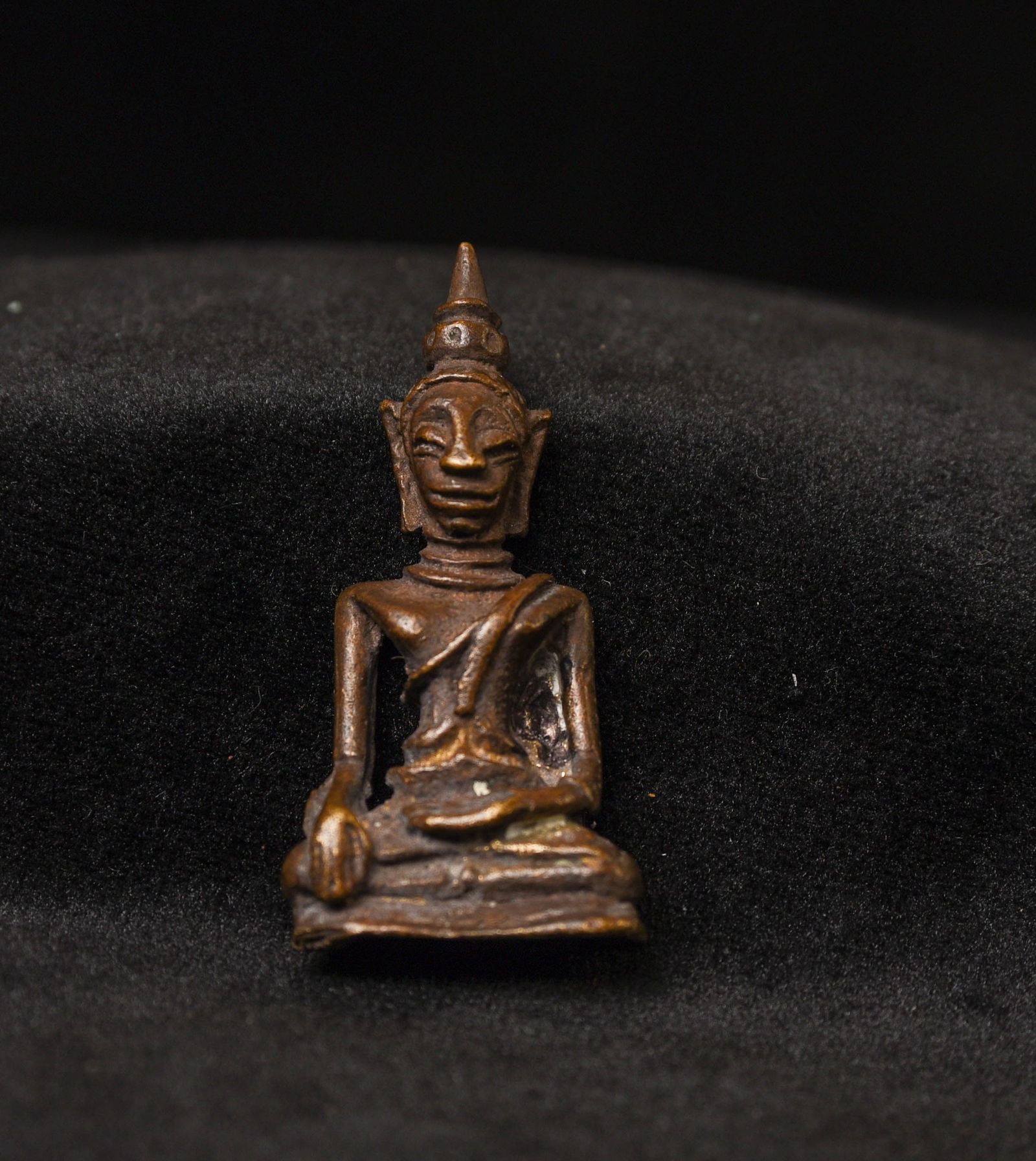 Vintage miniature solid-cast Laos Buddha.: Vintage solid-cast miniature Solid-cast Laos Buddha. ( 1.625"H x 0.875"W )