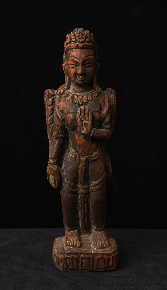 Vintage/antique Nepalese wooden Bodhisattva.: Vintage/antique Nepalese wooden Bodhisattva. Back set up so that it can be hung on the wall.