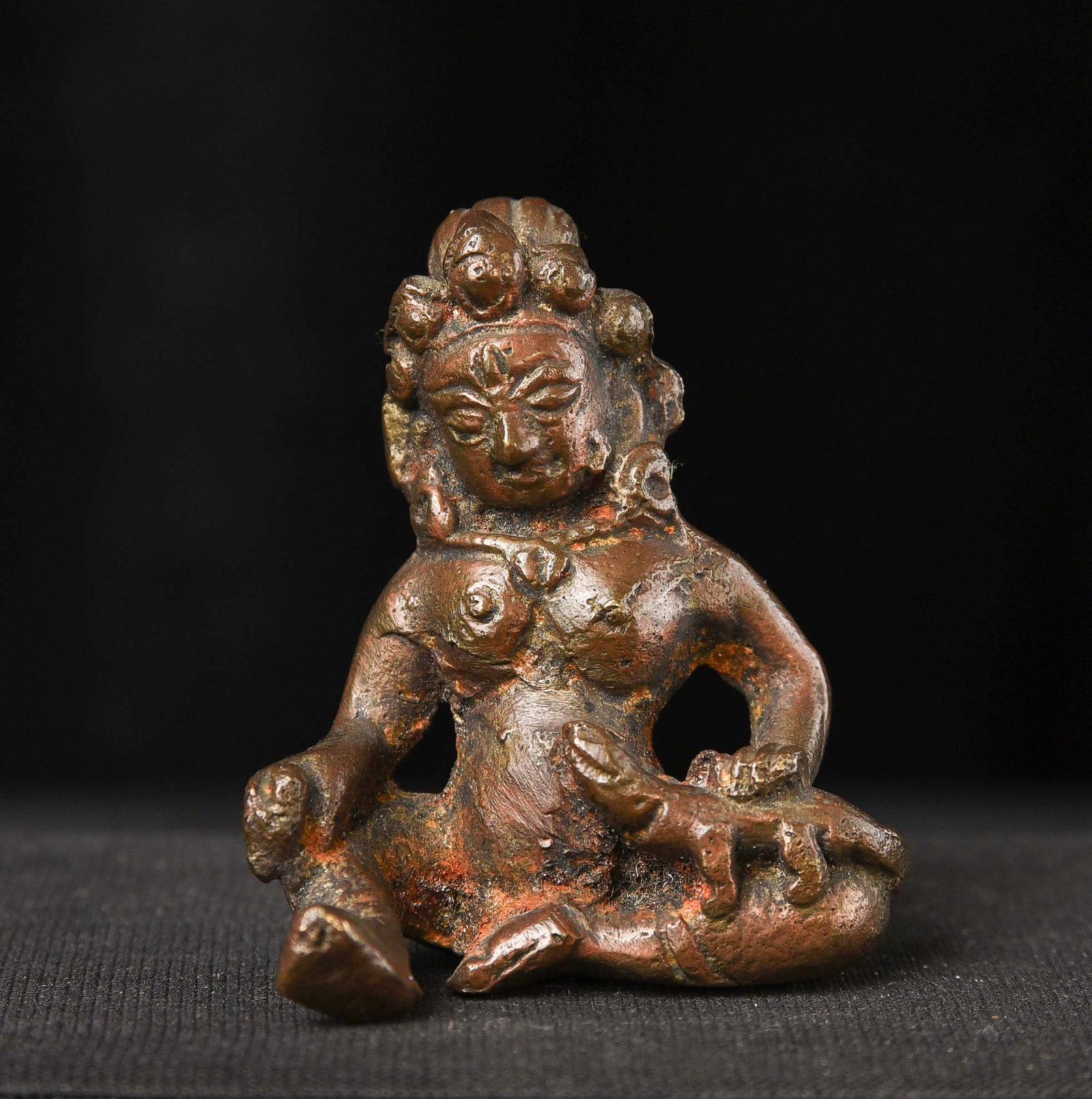 Jambala with his mongoose who spits wealth granting jewels.: Jambala with his mongoose, who spits wealth-granting jewels. It is in s 1tghC or earlier style and looks very worn and old, but it is probably 20th century. ( 2"H x 1.875W?105g Domestic packing and sh