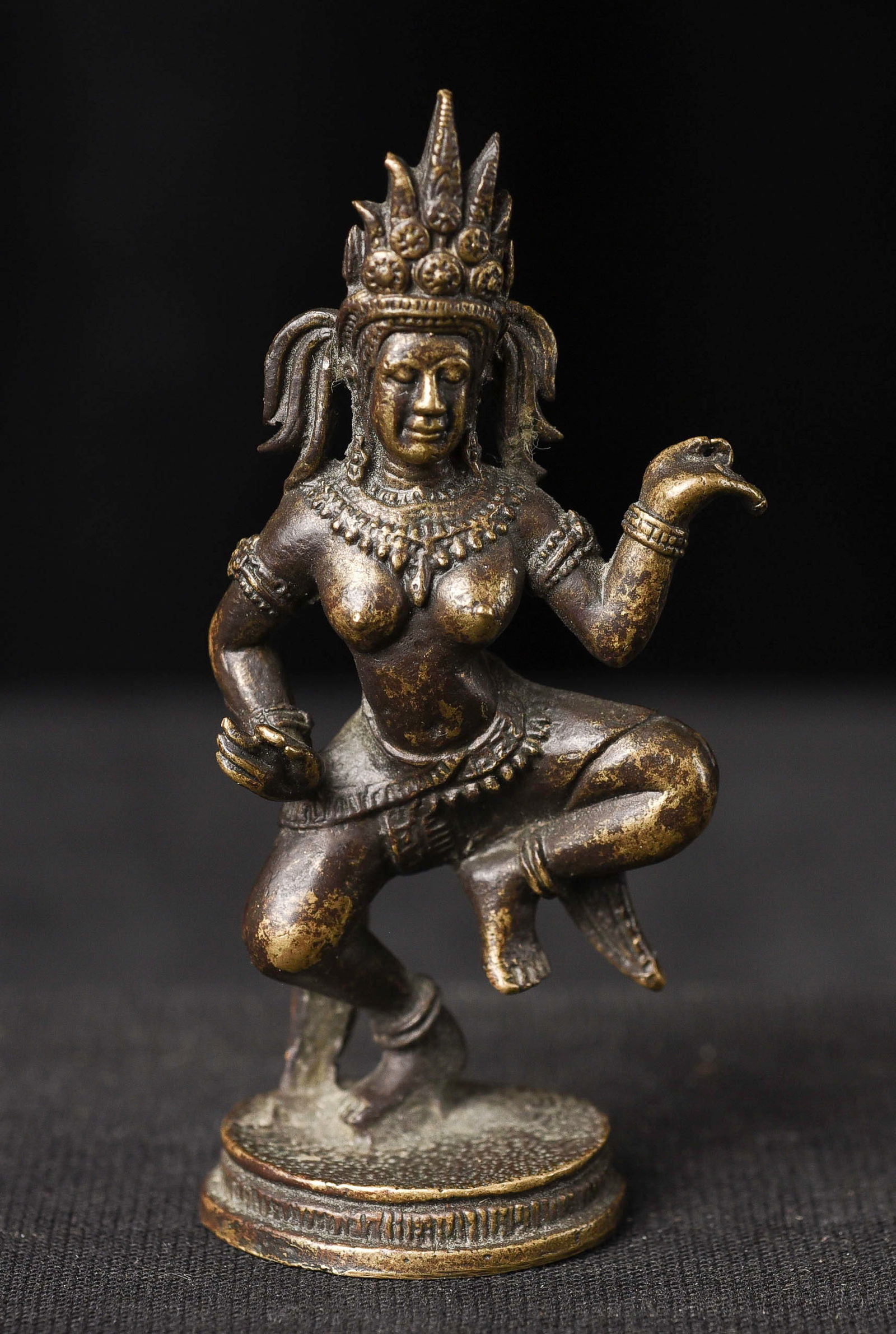 Thai or Cambodian miniature bronze dancer.: Thai or Cambodian miniature bronze dancer. At first, I thought this was a tourist piece. It came to me from a very good collection as part of a group purchase. I was really surprised by the superb qua