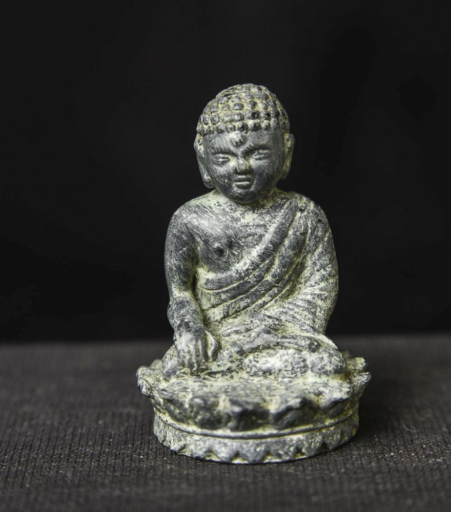 Mystery antique solid- castLead/Bronze Buddha: Mystery antique solid-cast Buddha made of a lead/bronze alloy. Sits 1.5 inches tall. Looks to be wax or sand cast (with great care). Possibly extremely early. Starting price lowered significantly. ( 1