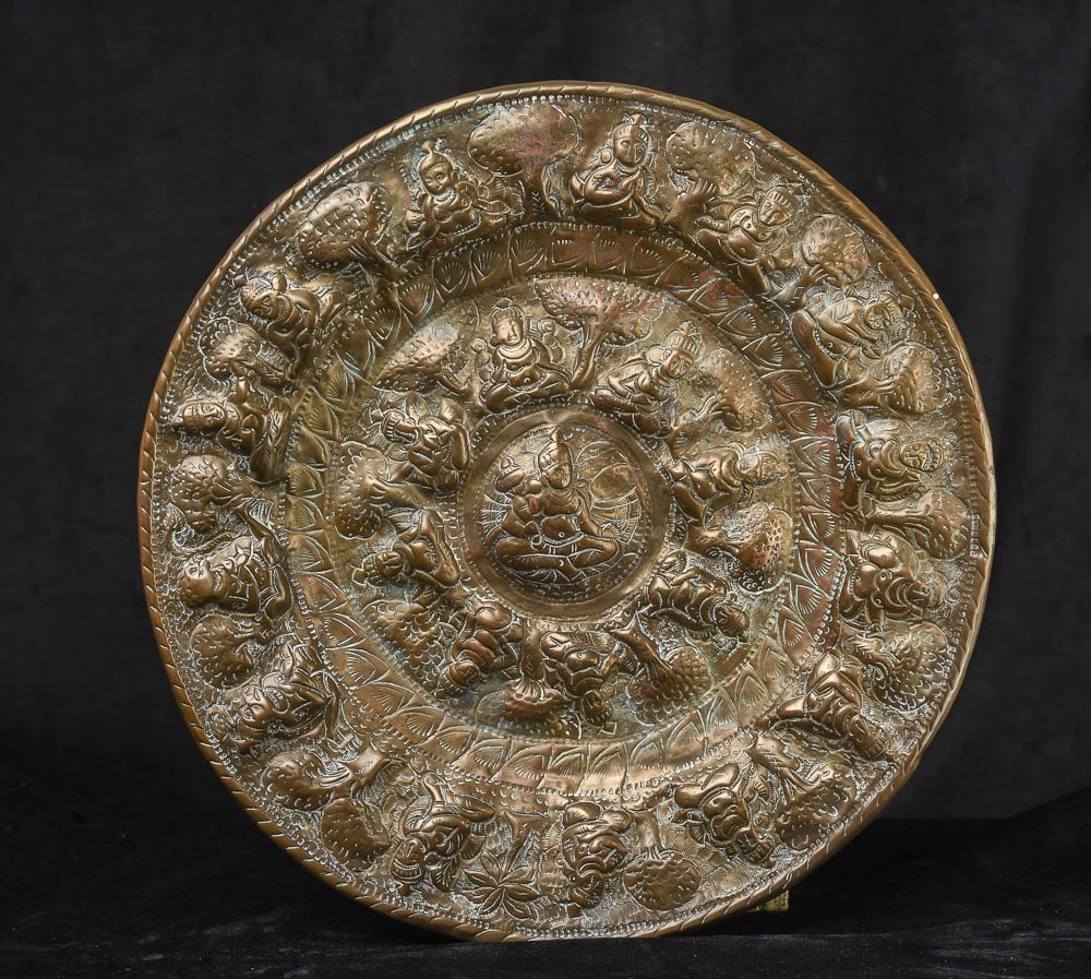 Older Hindu plaque of repousse brass --10.75" in: Older Hindu plaque of repousse brass - Significant wear. (10.5"diameter) - 515g