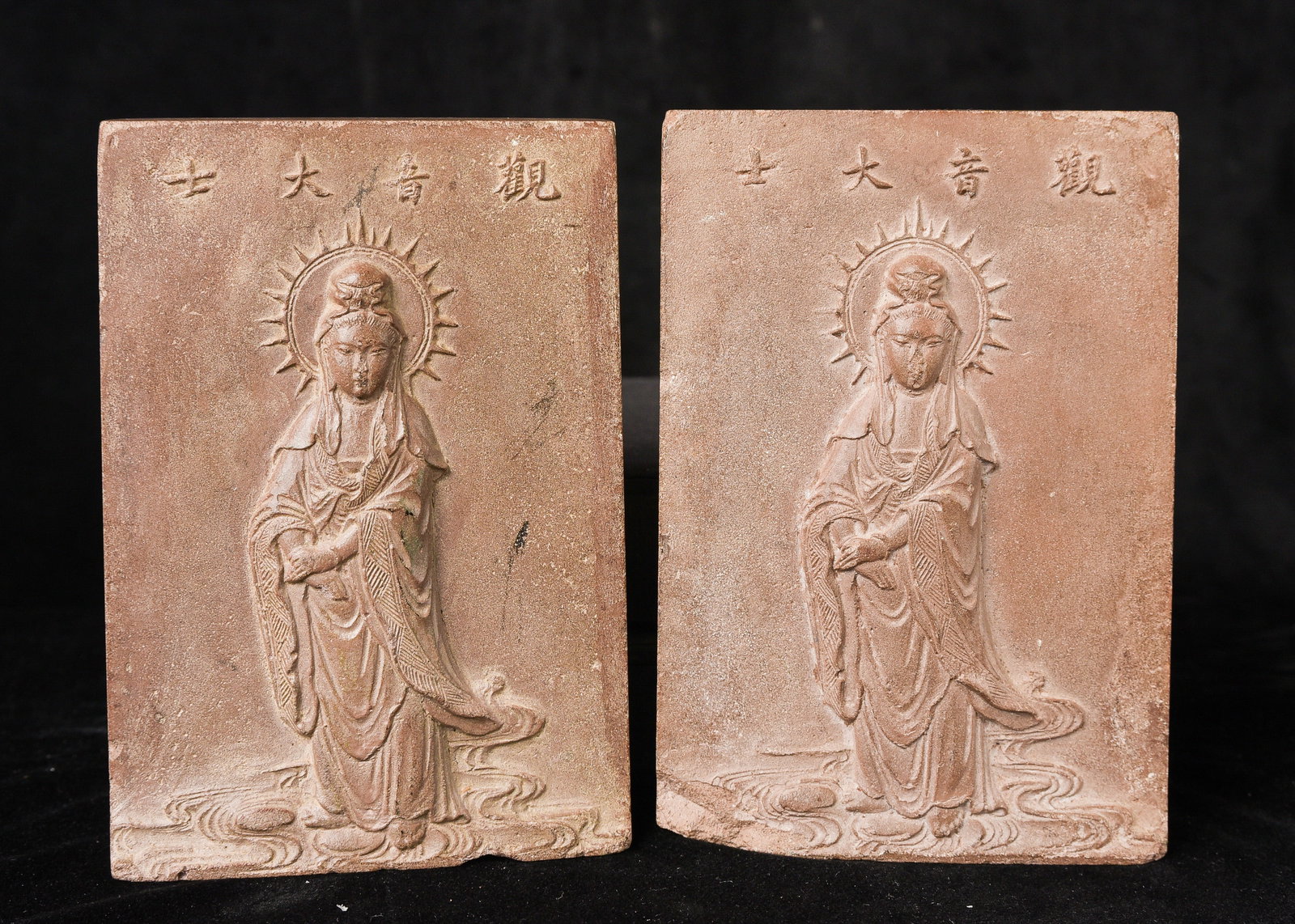 Pair of Antique Quanyin ) terracotta figures. .: Pair of Antique Quanyin ) terracotta figures. . Loss to the facial features as shown in the photos. Figures possibly carved rather than cast, as the details are so crisp.and finished. Finely worked an