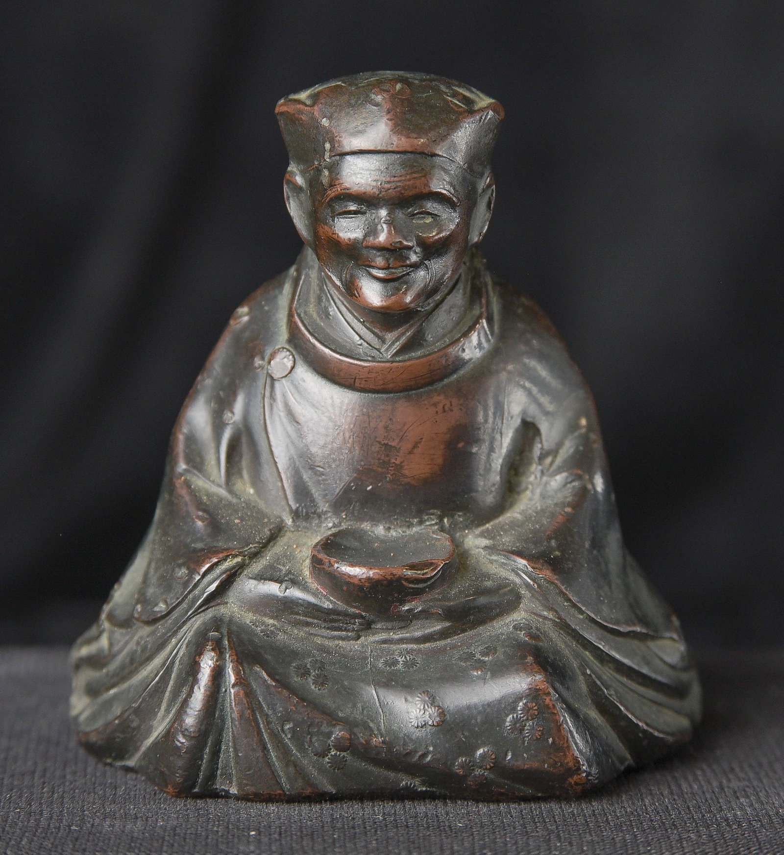 Wonderful solid-cast lead/bronze figure with reddish patina-possibly applied as part of the (1 of 11)