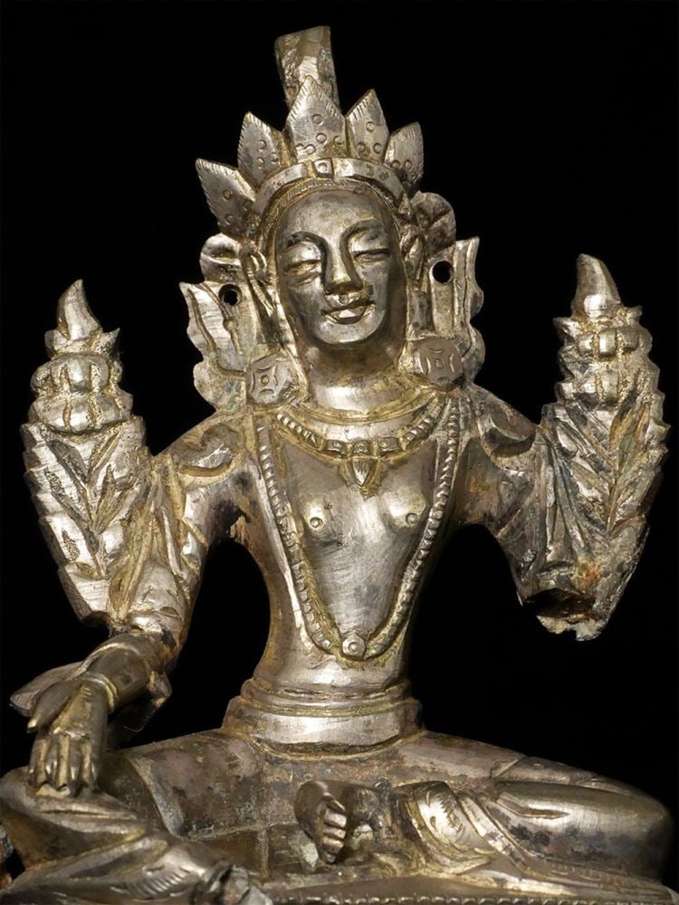 19thC Mongolian or Tibetan Bodhisattva cast out of a silver alloy. (1 of 9)