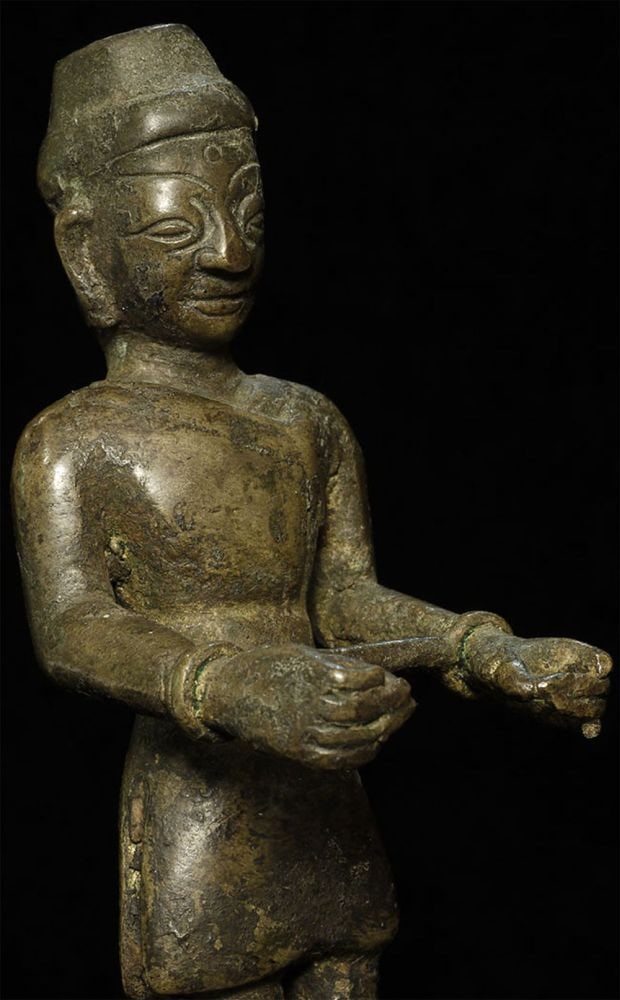 Very unusual Southeast Asian figure.: Very unusual Southeast Asian figure. Possibly Burmese, though the sliding base is more typical in India. Quite old, but unsure how to date. 5 7/8 inches tall, bottom of base measures 3 3/8" x 4.25"
