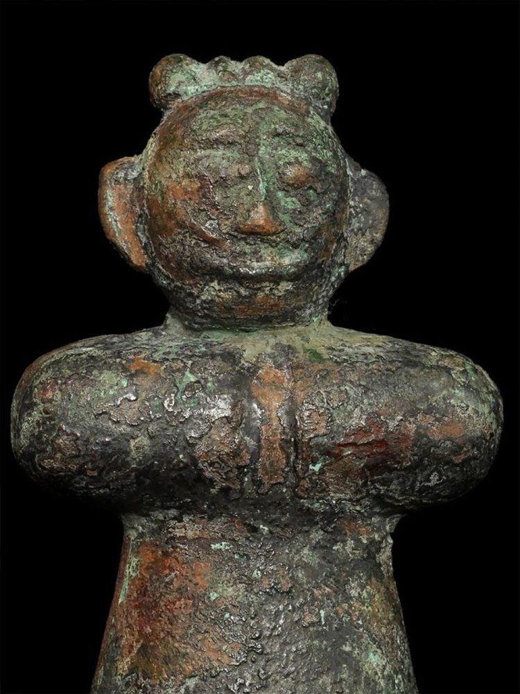 Ancient Chinese bronze. Has an old price tag with price of $1650: Early Chinese bronze. Has an old price tag with a price tag of $1650. Our listing price is less than 1/3 of that price. Stands 4 3/8 inches tall and 6 5/8 inches on its custom base.