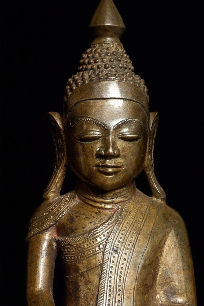 Superb 19thC Burmese Shan Buddha. Leans a bit to one: Superb 19thC Burmese Shan Buddha. Leans a bit to one side. One of the nicest examples of this type I have had in this size. Sits 8" tall, 10" on custom base.