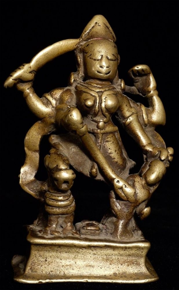 18th Century (or earlier) India bronze Durga.: 18th Century (or earlier) India bronze Durga. She measures 3.5" tall, closer to 5 inches on her custom stand. Wonderfully sweet face is as good as any on a Durga as I've seen. The ritual wear has