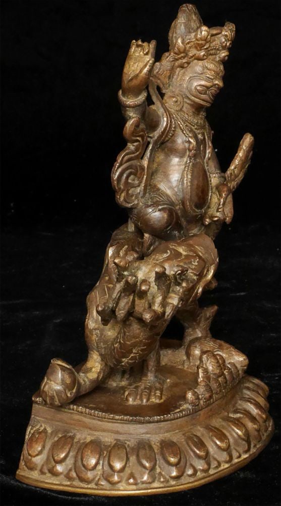 Antique Solid-cast Mongolian deity on dragon. - 5