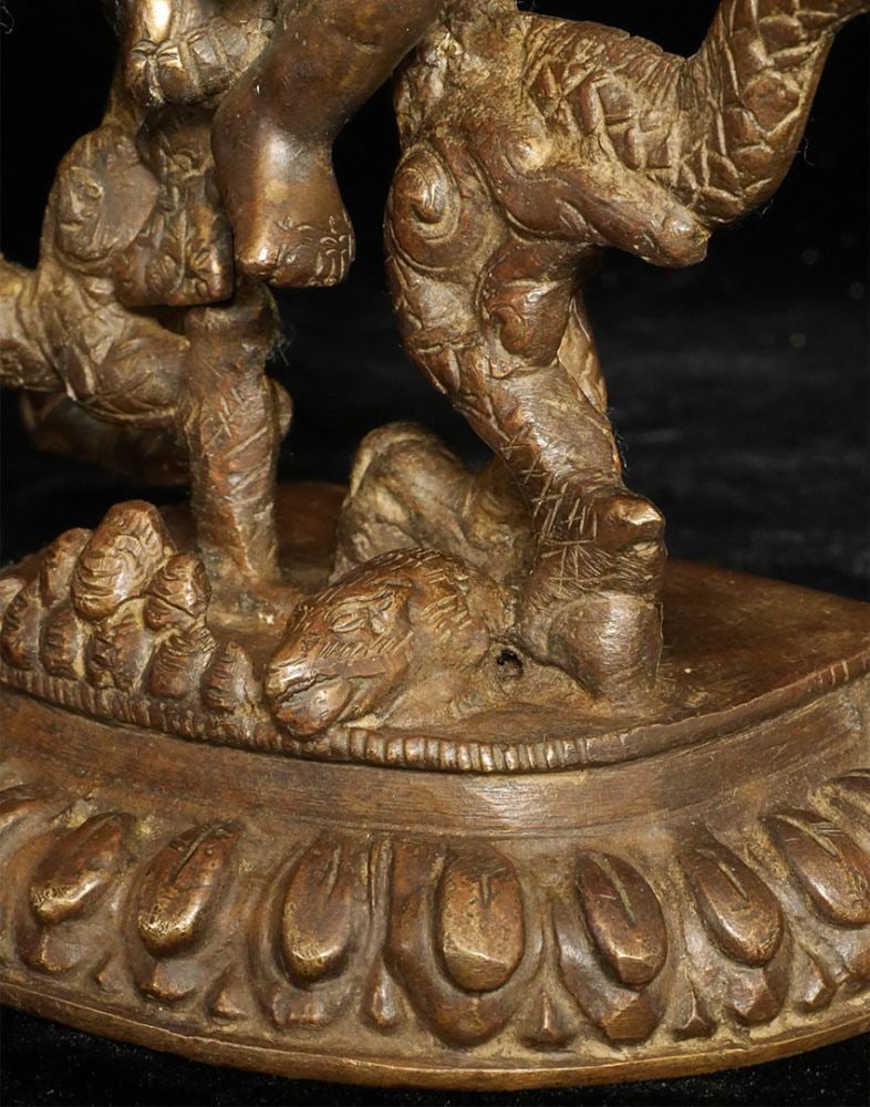 Antique Solid-cast Mongolian deity on dragon. - 6